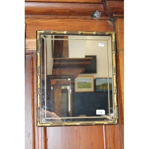 718 - Wall mirror with faux bamboo gilt frame, 43cm x 38cm.