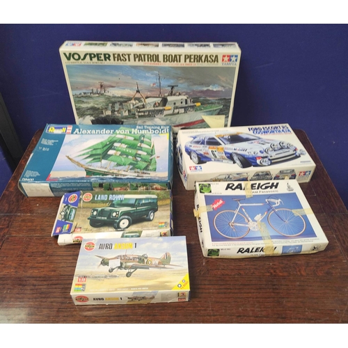 92 - Group of kit models to include an Airfix 1:43 scale Land Rover 01411, Airfix 1:72 Avro Anson 1 02009... 