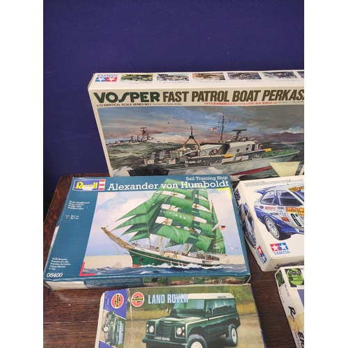 92 - Group of kit models to include an Airfix 1:43 scale Land Rover 01411, Airfix 1:72 Avro Anson 1 02009... 