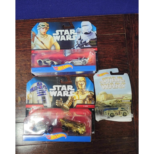 96 - Hotwheels. Box of collectible Star Wars model vehicles to include Tatooine Vanster, Boba Fett and Bo... 