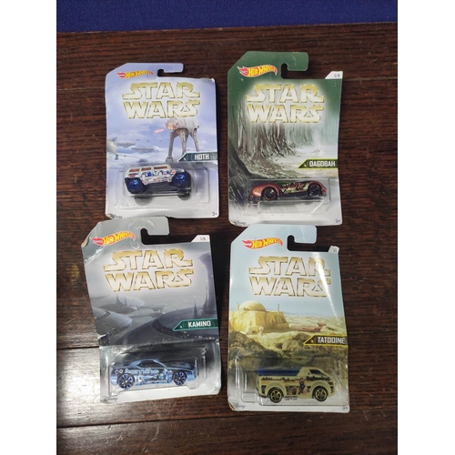 96 - Hotwheels. Box of collectible Star Wars model vehicles to include Tatooine Vanster, Boba Fett and Bo... 