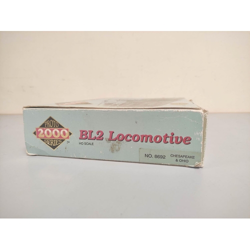 138 - Boxed HO gauge Proto Series 2000 BL2 8692 Western Maryland Locomotive plus a box of N gauge locomoti... 