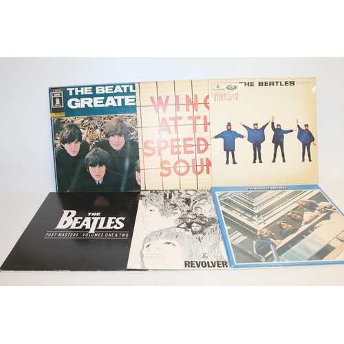 306 - Collection of Beatles records to include The Beatles Greatest (German Pressing), Help!, The Beatles ... 