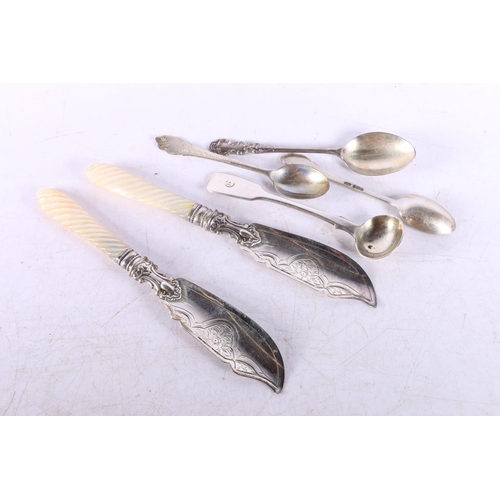 650A - Pair of Victorian silver fish knives with mother of pearl handles, three silver coffee spoons and a ... 