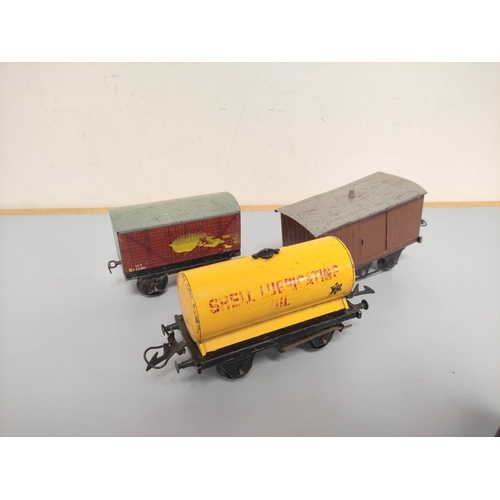 129 - Group of 0 gauge tin plate locomotives and rolling stock to include a Hornby Meccano type 30 loco no... 