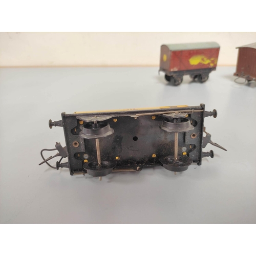 129 - Group of 0 gauge tin plate locomotives and rolling stock to include a Hornby Meccano type 30 loco no... 