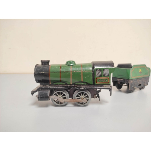 129 - Group of 0 gauge tin plate locomotives and rolling stock to include a Hornby Meccano type 30 loco no... 