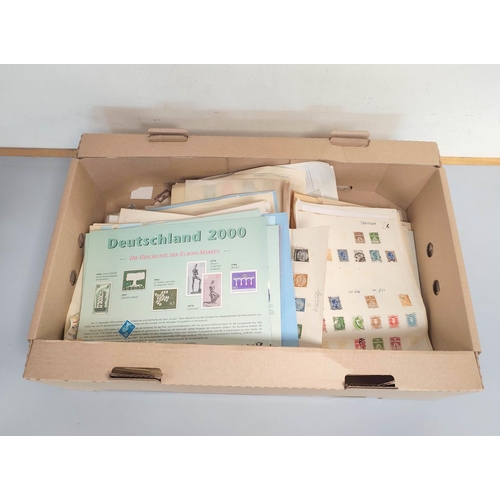 247 - Box containing a large quantity of mixed world postage stamps and album sheets to include issues fro... 