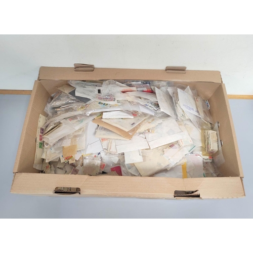 248 - Box containing a large quantity of mixed world postage stamps.