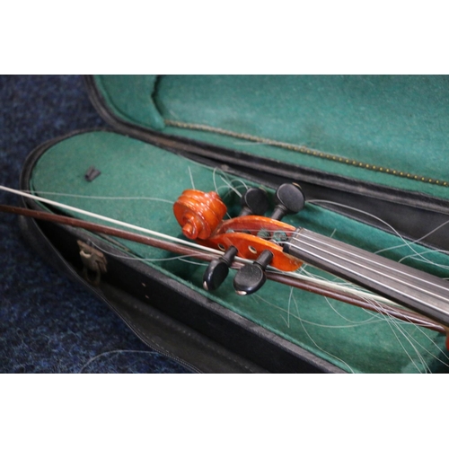 138 - Violin in hard case.