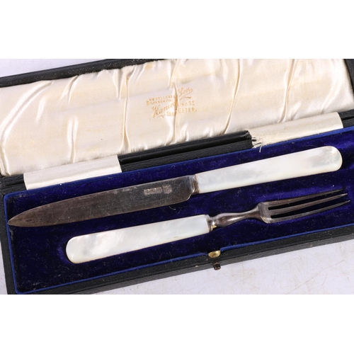 598 - George V silver fruit knife and fork with mother-of-pearl handles, hallmarked Isaac Ellis & Sons... 