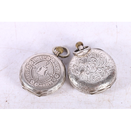 603 - Two continental fob watches with cases marked 935. 3cm diameter.