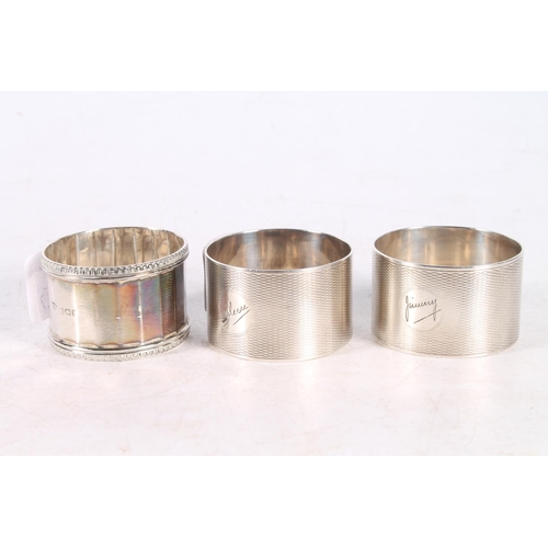 619 - Three silver hallmarked napkin rings, 89g gross.