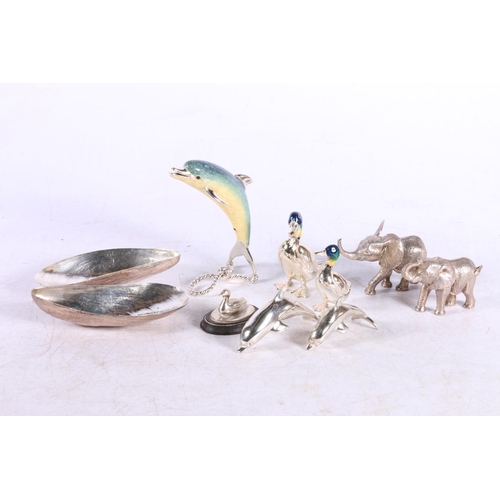 628 - Dolphin table ornament marked Italy 925, 8cm, also white metal ducks, mussel shells, etc.