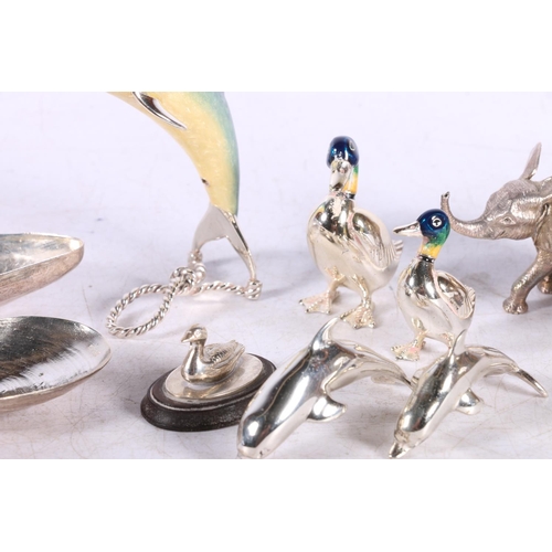 628 - Dolphin table ornament marked Italy 925, 8cm, also white metal ducks, mussel shells, etc.