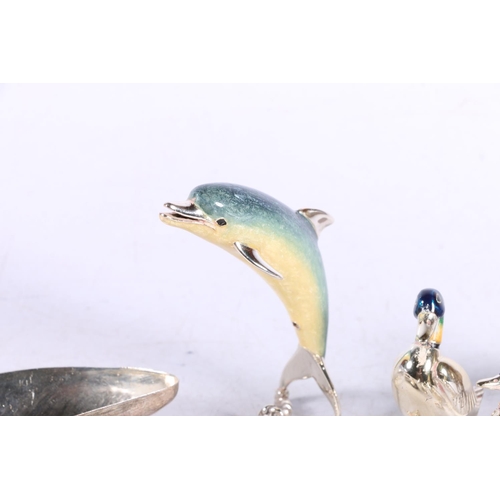 628 - Dolphin table ornament marked Italy 925, 8cm, also white metal ducks, mussel shells, etc.