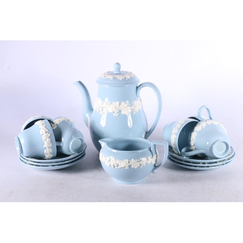 169 - Wedgwood Queensware coffee set, blue ground with embossed cream trailing ivy leaves, comprising a co... 