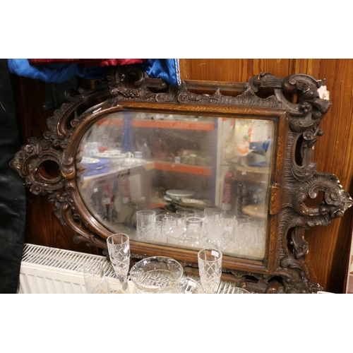 199 - Composition mirror, with rococo style frame, 92cm x 60cm.