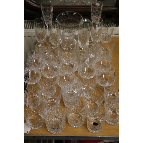 200 - Crystal glass to include whisky glasses, champagne flutes, etc.