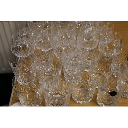 200 - Crystal glass to include whisky glasses, champagne flutes, etc.