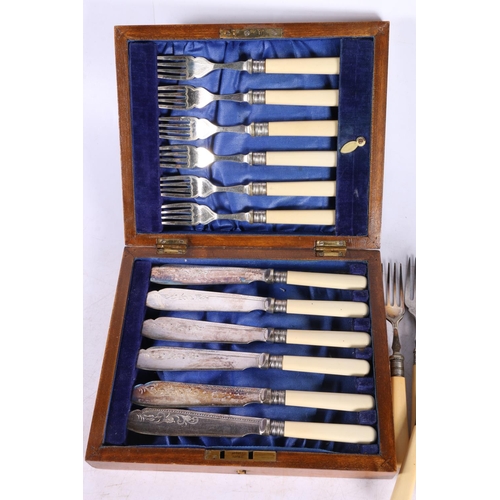 203 - Canteen containing fish knives and forks, along with loose flatware.