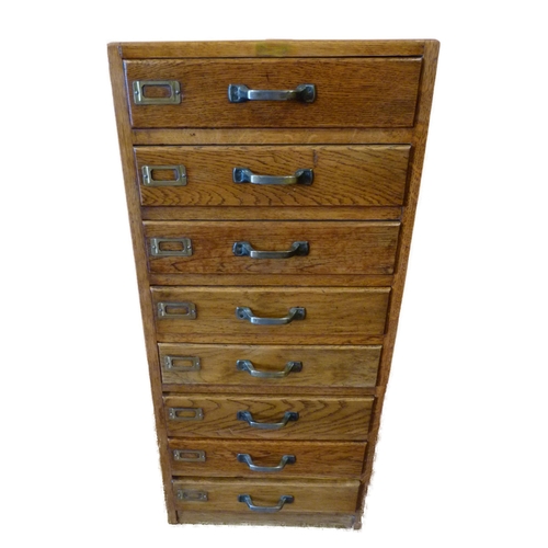 426 - Oak filing cabinet of eight drawers, 104cm high, 47cm wide and 37cm deep.