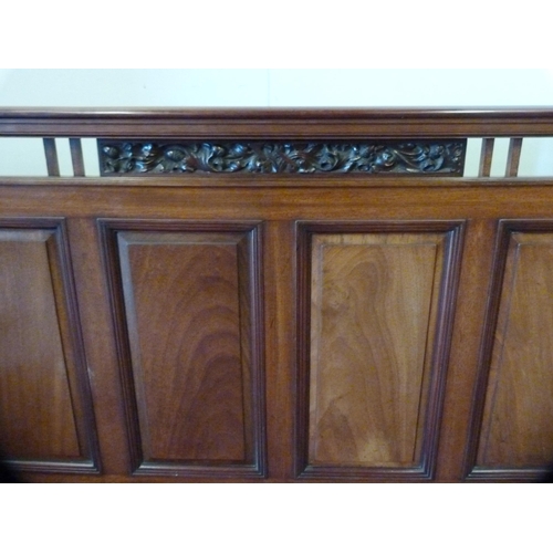 428 - Aesthetic-style mahogany hall bench, the panelled back with fruit and vine carvings, scroll arm rest... 