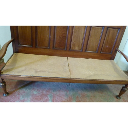 428 - Aesthetic-style mahogany hall bench, the panelled back with fruit and vine carvings, scroll arm rest... 