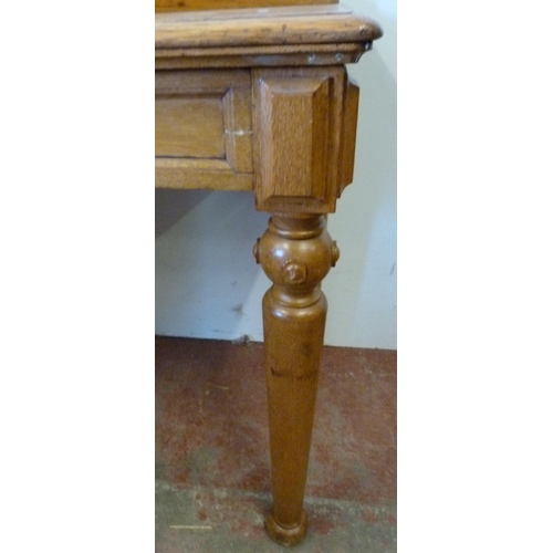 330 - Pugin-style oak console table with rectangular top, on shaped supports, 79cm high, 143cm wide and 55... 