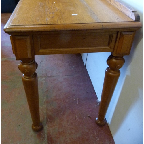 330 - Pugin-style oak console table with rectangular top, on shaped supports, 79cm high, 143cm wide and 55... 