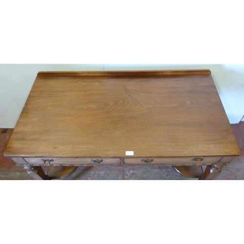 333 - Pugin-style mahogany hall table with faux drawers, on ornate supports united by a shelved undertier,... 