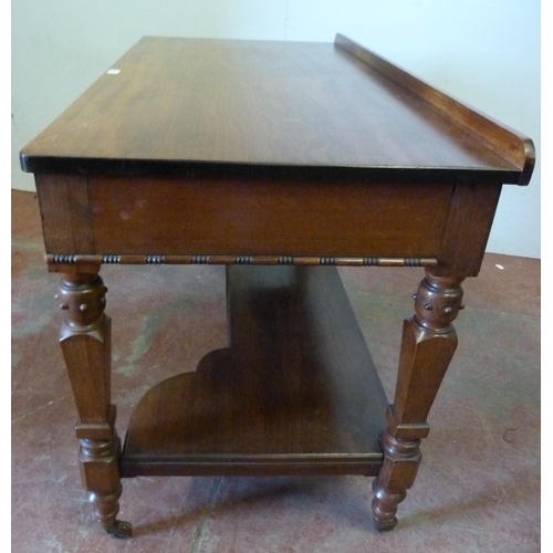 333 - Pugin-style mahogany hall table with faux drawers, on ornate supports united by a shelved undertier,... 