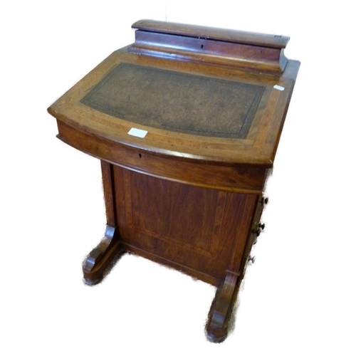 334 - Victorian inlaid walnut davenport with stationery compartment above a tooled writing flap enclosing ... 