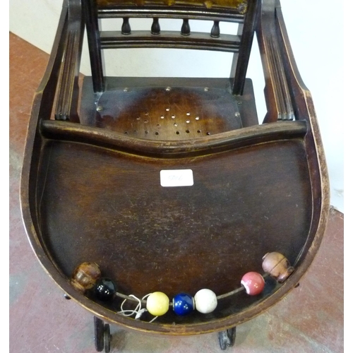 336 - Metamorphic child's high/feeding chair with metal fittings, on metal castors.