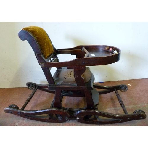 336 - Metamorphic child's high/feeding chair with metal fittings, on metal castors.