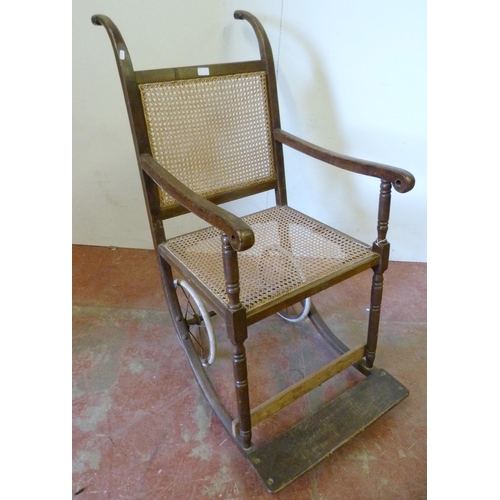 340 - Vintage Sudan-style bergère invalid's chair with cane back rest and seat, shaped frame and footrest,... 