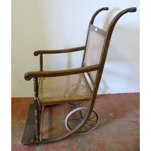 340 - Vintage Sudan-style bergère invalid's chair with cane back rest and seat, shaped frame and footrest,... 