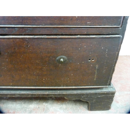 344 - 18th century oak bachelor's chest of four graduated drawers, on bracket feet, 79cm high, 81cm wide a... 