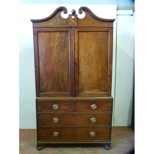 345 - 19th century Gillows-style mahogany linen press, the scroll pediment above two doors, two short and ... 