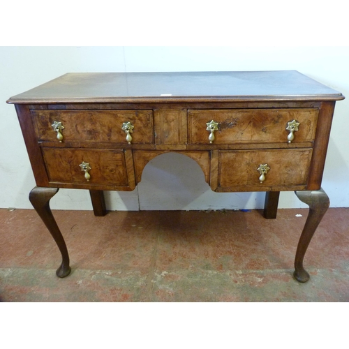 346 - George III figured walnut lowboy with two short drawers above two deep drawers, on cabriole supports... 