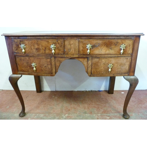 346 - George III figured walnut lowboy with two short drawers above two deep drawers, on cabriole supports... 