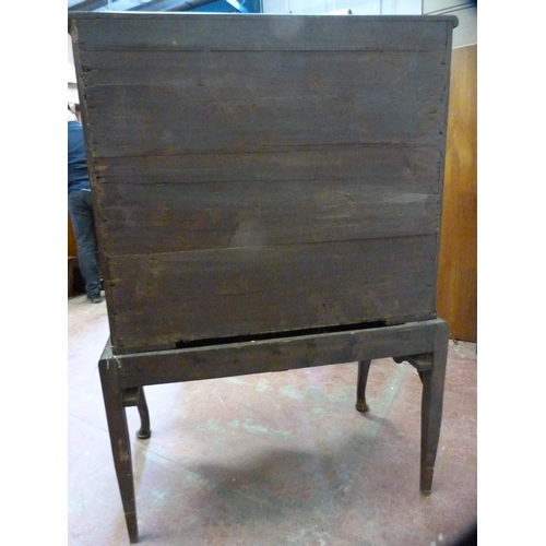 348 - George III walnut chest on stand with three short and three long drawers, on a single-drawer table b... 