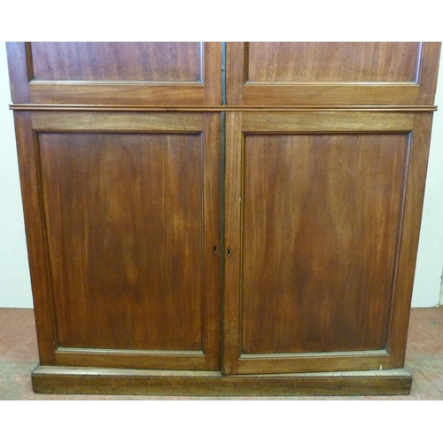 349 - 19th century mahogany linen press with two doors enclosing drawers above two matching doors enclosin... 