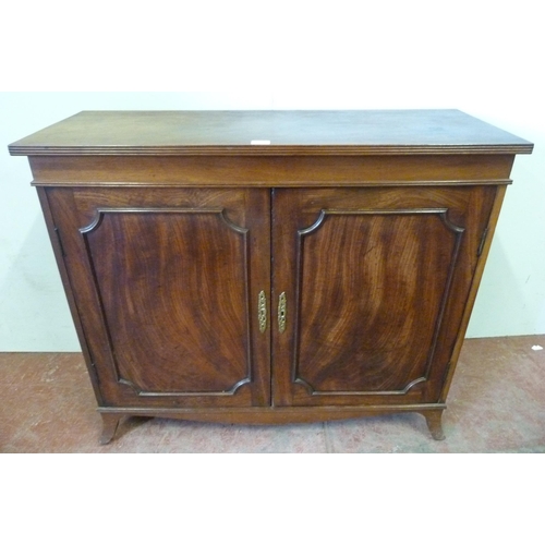 354 - Regency-style 19th century mahogany cupboard of low form, with two cupboard doors enclosing a shelve... 