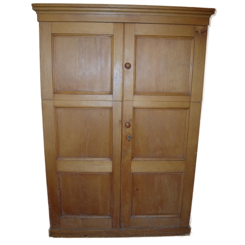 357 - Victorian pitch pine press with two cupboard doors enclosing a shelved interior above two larger doo... 