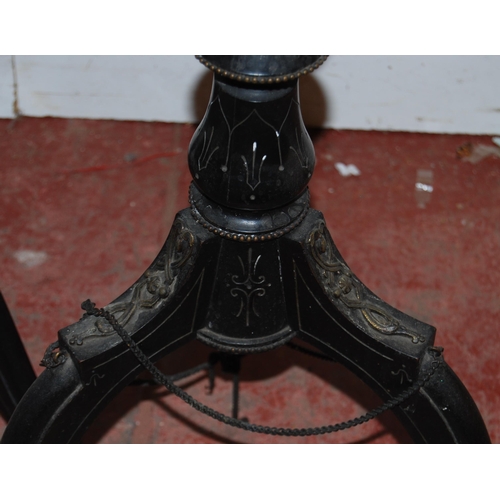 359 - Pair of French Empire-style ebonised torchères, each with a saucer top above a tapered column and tr... 