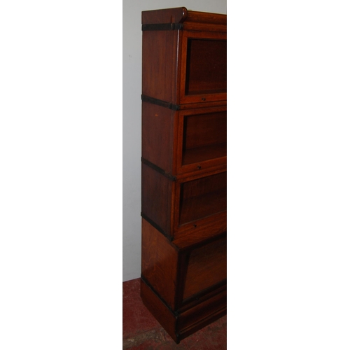 369 - Oak stacking bookcase with four graduated glazed sections, on base, 161cm high, 87cm wide and 31.5cm... 