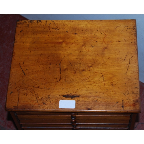 371 - Victorian mahogany specimen chest of eleven matching shallow drawers above a deep drawer, with turne... 