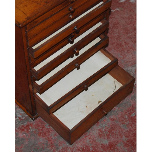 371 - Victorian mahogany specimen chest of eleven matching shallow drawers above a deep drawer, with turne... 