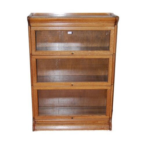 374 - Oak stacking bookcase with detachable cornice above three glazed sections, on base, 124cm high, 87cm... 